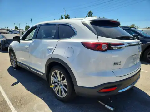 JM3TCBEY3P0640509 — 2023 Mazda CX-9, photo 2 from Copart 22.09.2026, All-over damage