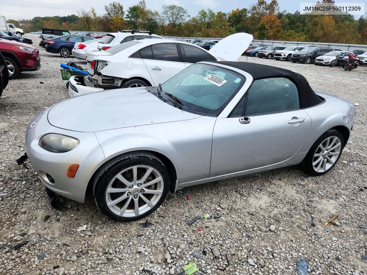 JM1NC25F960112309 Mazda MX-5 2006 — Front end damage, before-repair photo