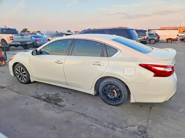 1N4AL3AP7GC248902 — 2016 Nissan Altima, photo 2 from Copart, Side