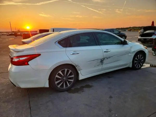 1N4AL3AP7GC248902 — 2016 Nissan Altima, photo 3 from Copart, Side