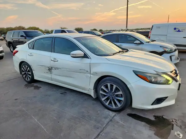 1N4AL3AP7GC248902 — 2016 Nissan Altima, photo 4 from Copart, Side