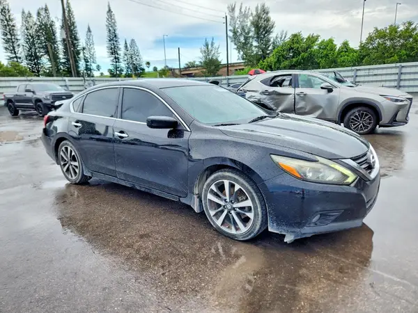 1N4BL3AP6GC224191 — 2016 Nissan Altima, photo 4 from Copart 30.09.2026, Rear end