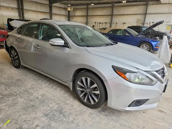 1N4AL3AP3GC243504 — 2016 Nissan Altima, foto 4 de Copart, Parte trasera