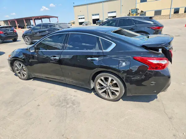 1N4AL3AP1GC258115 — 2016 Nissan Altima, фото 2 с аукциона Copart 03.10.2026, Задняя часть