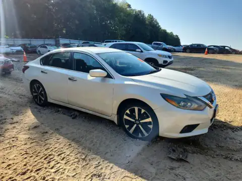 1N4AL3AP4JC106935 — 2018 Nissan Altima, photo 4 from Copart, Side