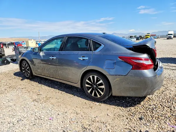 1N4AL3AP6JC173732 — 2018 Nissan Altima, photo 2 from Copart, Rear end