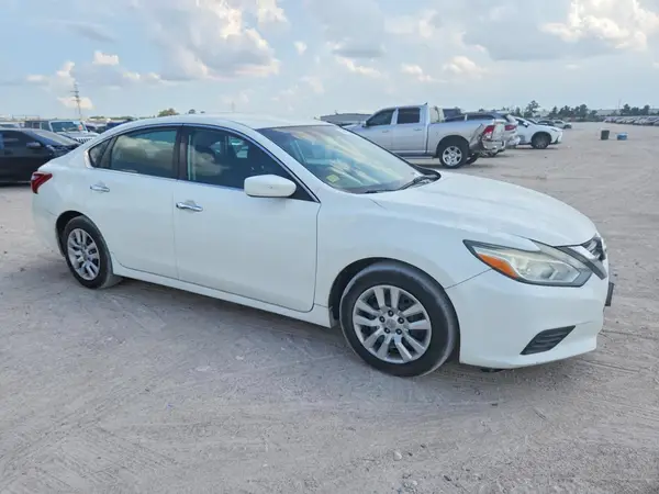 1N4AL3AP4JC142706 — 2018 Nissan Altima, zdjęcie 4 z Copart 02.10.2026, Bok