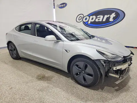 5YJ3E1EA7JF061290 — 2018 Tesla Model 3, photo 4 from Copart 23.10.2026, Rear end
