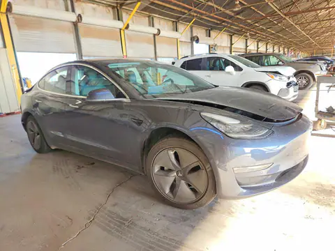 5YJ3E1EA2JF031520 — 2018 Tesla Model 3, photo 4 from Copart 30.09.2026, Rear end