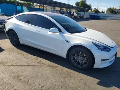 5YJ3E1EAXJF069951 — 2018 Tesla Model 3, photo 4 from Copart 24.09.2026, Rear end