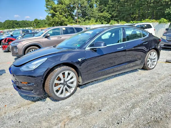 5YJ3E1EB3JF090438 — 2018 Tesla Model 3, Side (Side), before-repair photos