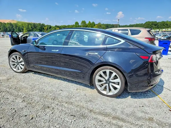 5YJ3E1EB3JF090438 — 2018 Tesla Model 3, photo 2 from Copart, Side