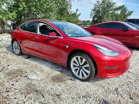 5YJ3E1EA8JF015502 — 2018 Tesla Model 3, photo 4 from Copart, Side
