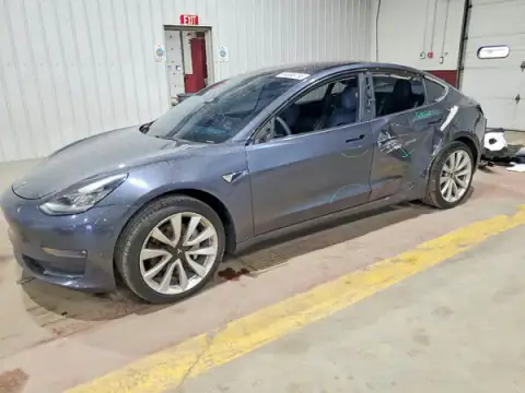 5YJ3E1EB6JF068787 Tesla Model 3 2018 — Side damage, before-repair photo