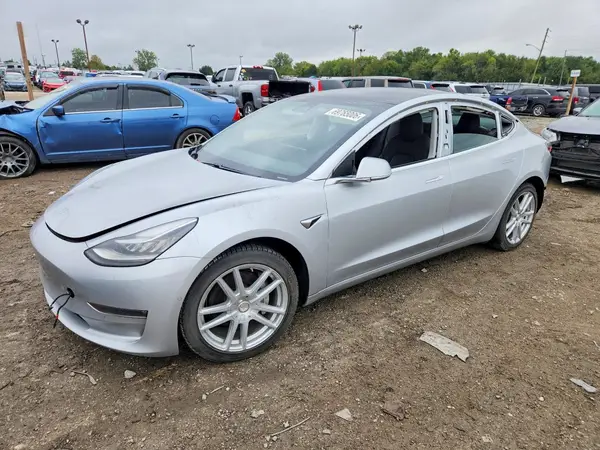 5YJ3E1EB8JF087499 Tesla Model 3 2018 — Rear end damage, before-repair photo