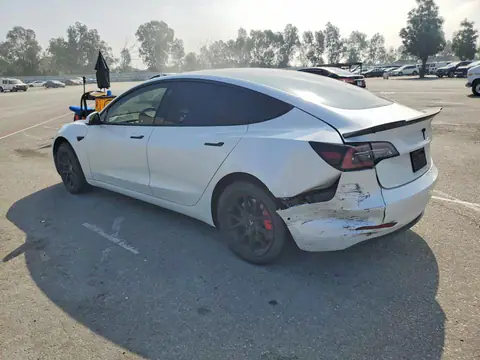 5YJ3E1EAXMF982164 — 2021 Tesla Model 3, photo 2 from Copart 29.09.2026, Rear end