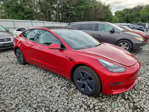 5YJ3E1EB5NF173374 — 2022 Tesla Model 3, photo 4 from Copart 28.09.2026, Side