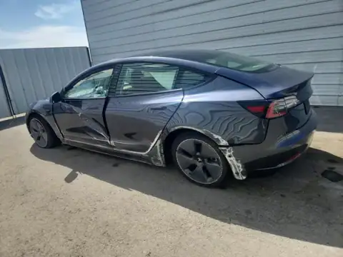 5YJ3E1EB8NF299034 — 2022 Tesla Model 3, foto 2 de Copart 05.10.2026, Lateral