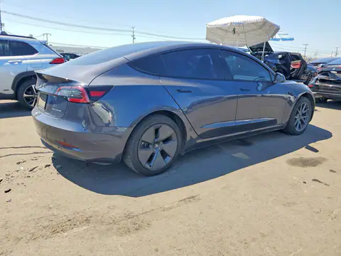 5YJ3E1EB8NF180268 — 2022 Tesla Model 3, photo 3 from Copart 14.10.2026, Side