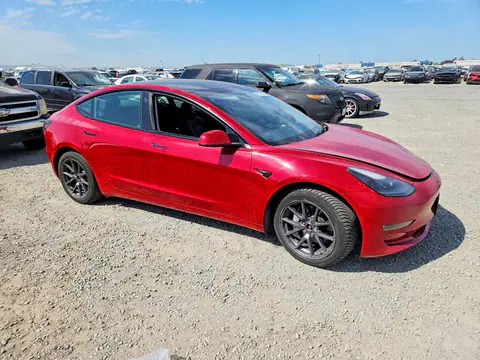 5YJ3E1EB6NF317899 — 2022 Tesla Model 3, foto 4 de Copart 23.10.2026, Lateral