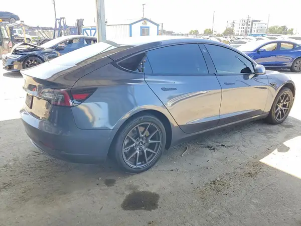 5YJ3E1EB3NF212768 — 2022 Tesla Model 3, photo 3 from Copart, Side