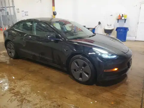 5YJ3E1EA9NF368501 — 2022 Tesla Model 3, photo 4 from Copart 23.09.2026, Side