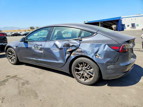 5YJ3E1EA2PF700345 — 2023 Tesla Model 3, photo 2 from Copart 28.10.2026, Side