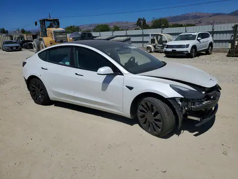 5YJ3E1EC0PF583690 — 2023 Tesla Model 3, photo 4 from Copart 22.10.2026, All-over damage