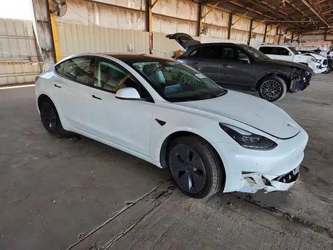 5YJ3E1EB4PF388862 — 2023 Tesla Model 3, zdjęcie 4 z Copart 19.10.2026, Przód