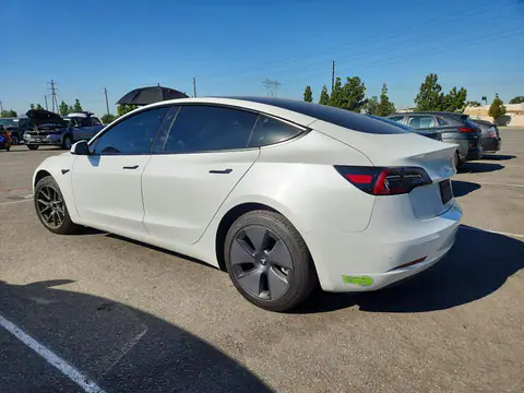5YJ3E1EAXPF606150 — 2023 Tesla Model 3, photo 2 from Copart 20.10.2026, Side
