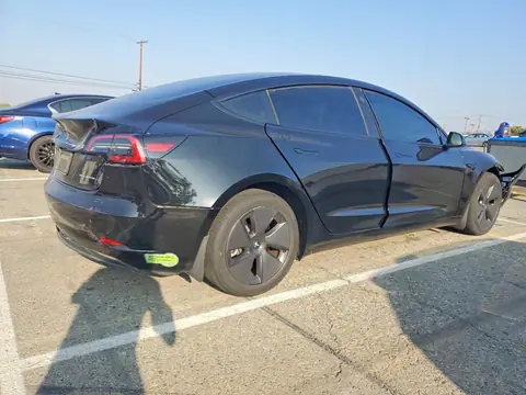 5YJ3E1EB2PF632458 — 2023 Tesla Model 3, zdjęcie 3 z Copart 26.10.2026, Tył