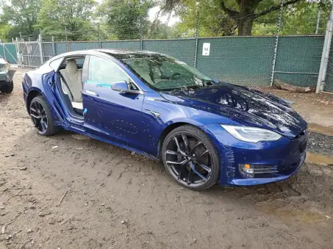 5YJSA1E21JF288233 — 2018 Tesla Model S, photo 4 from Copart 29.09.2026, Side