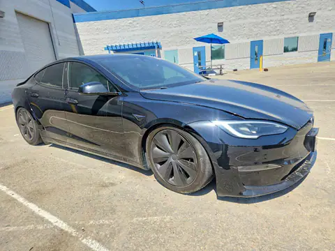 5YJSA1E5XPF499756 — 2023 Tesla Model S, photo 4 from Copart 20.10.2026, Rear end