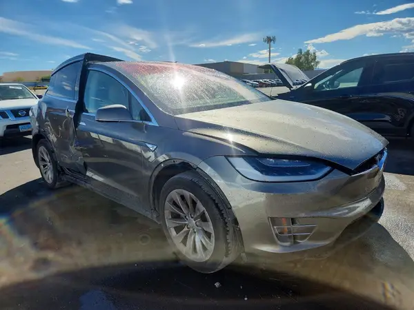 5YJXCBE22GF016594 — 2016 Tesla Model X, photo 4 from Copart 29.09.2026, Side