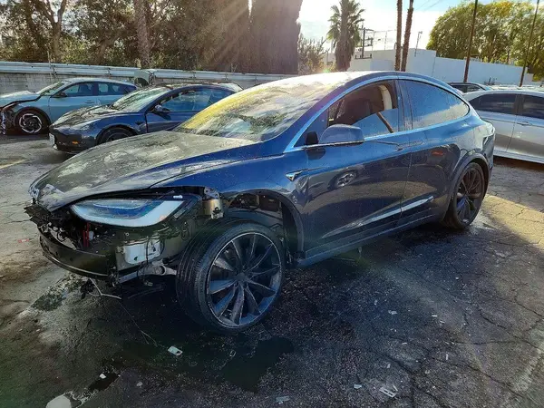 5YJXCBE29GF027883 — 2016 Tesla Model X, Undercarriage damage (Undercarriage), before-repair photos