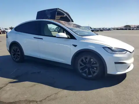 7SAXCAE50NF354774 — 2022 Tesla Model X, photo 4 from Copart 23.09.2026, All-over damage