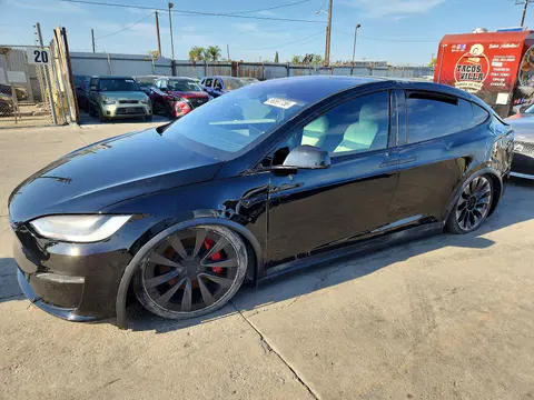 7SAXCBE61PF404194 — 2023 Tesla Model X, Rollover (Rollover), before-repair photos