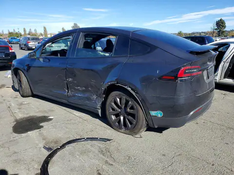 7SAXCBE50RF459987 — 2024 Tesla Model X, foto 2 de Copart 30.10.2026, Lateral