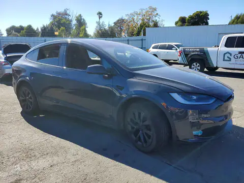 7SAXCBE50RF459987 — 2024 Tesla Model X, foto 4 de Copart 30.10.2026, Lateral