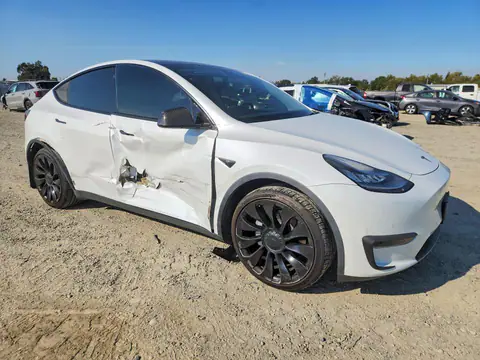 5YJYGDEE0LF004372 — 2020 Tesla Model Y, photo 4 from Copart 29.10.2026, Side