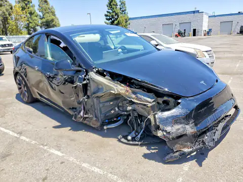 5YJYGDEF4MF273310 — 2021 Tesla Model Y, photo 4 from Copart 29.09.2026, Side