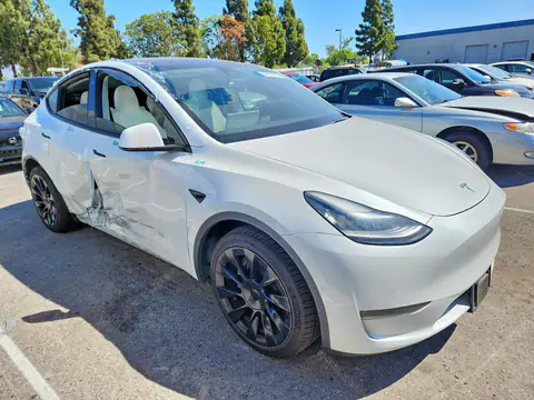 5YJYGDEE3MF098359 — 2021 Tesla Model Y, photo 4 from Copart 13.10.2026, Side