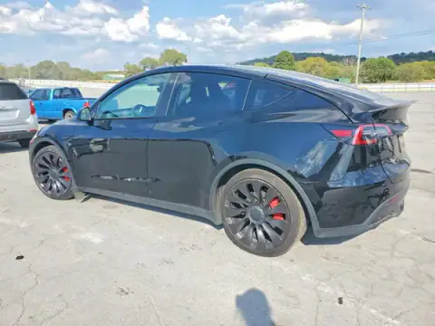 5YJYGDEF3MF304773 — 2021 Tesla Model Y, photo 2 from Copart 21.09.2026, Side