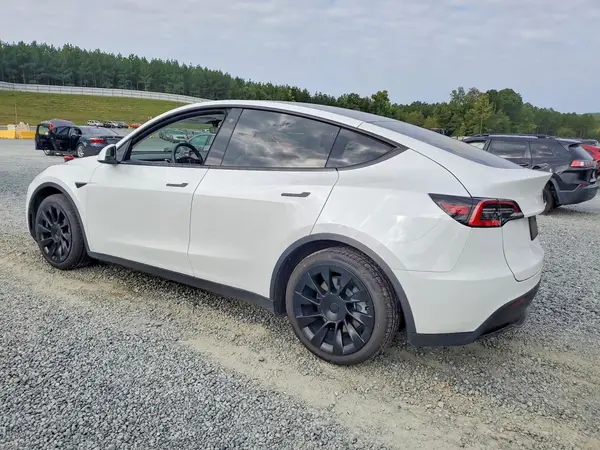5YJYGDEE7MF093519 — 2021 Tesla Model Y, фото 2 з Copart 08.10.2026, Бокова частина
