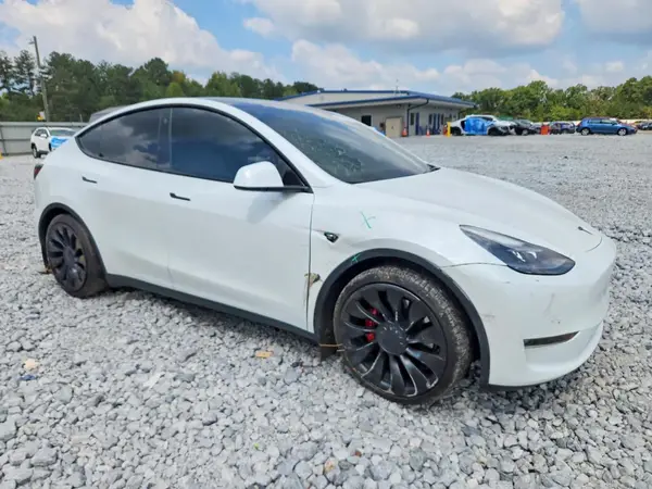 5YJYGDEF5MF304399 — 2021 Tesla Model Y, photo 4 from Copart, Side