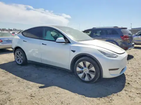 7SAYGAEE2NF570361 — 2022 Tesla Model Y, zdjęcie 4 z Copart 22.09.2026, Tył