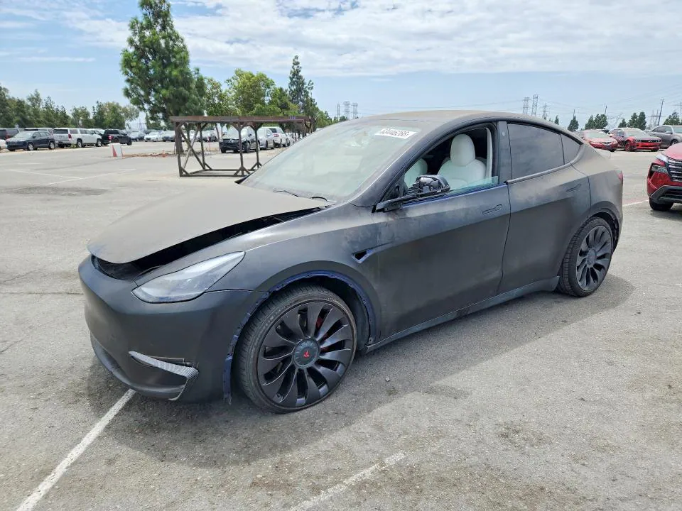 2022 Tesla Model Y VIN 7SAYGDEF9NF387615 фото 1