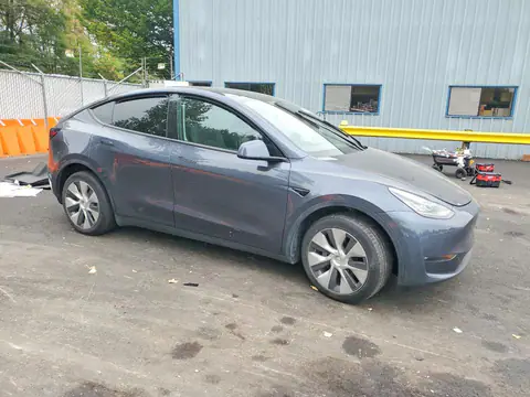 7SAYGDEE8NF454714 — 2022 Tesla Model Y, zdjęcie 4 z Copart 30.09.2026, Bok
