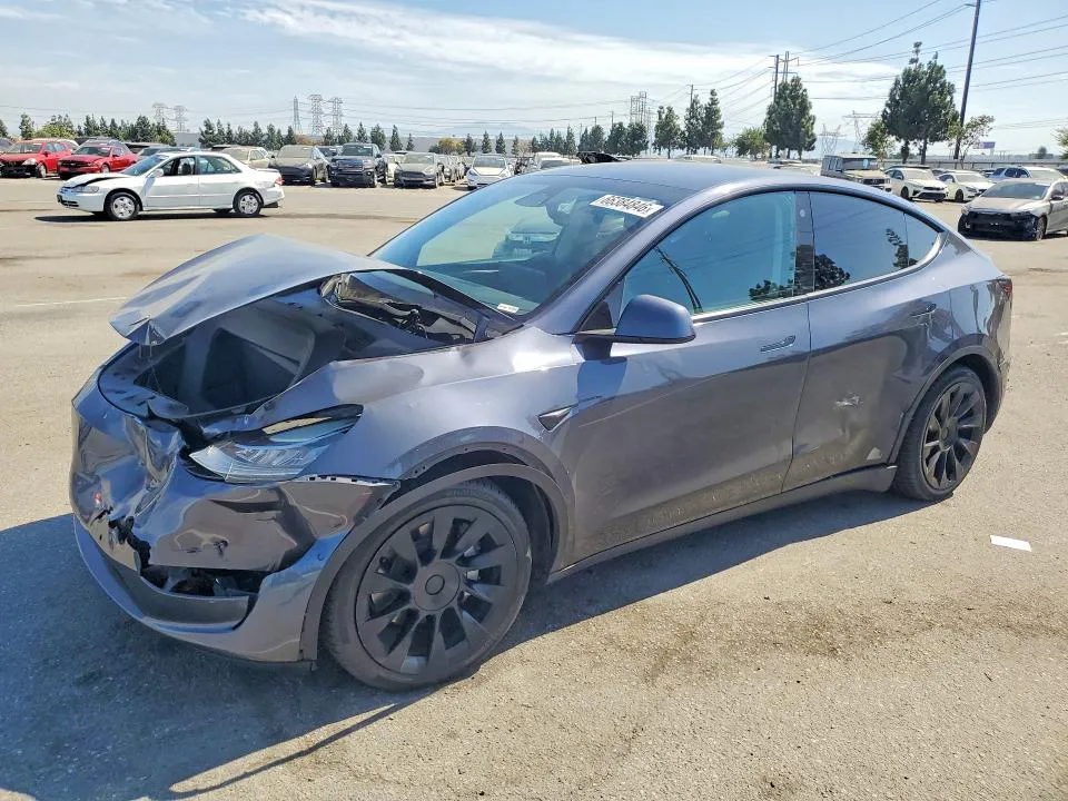 2022 Tesla Model Y VIN 7SAYGAEE6NF574137 фото 1