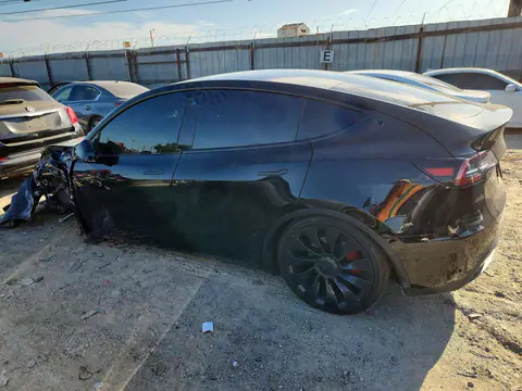 2022 Tesla Model Y VIN 7SAYGDEFXNF338505 фото 2